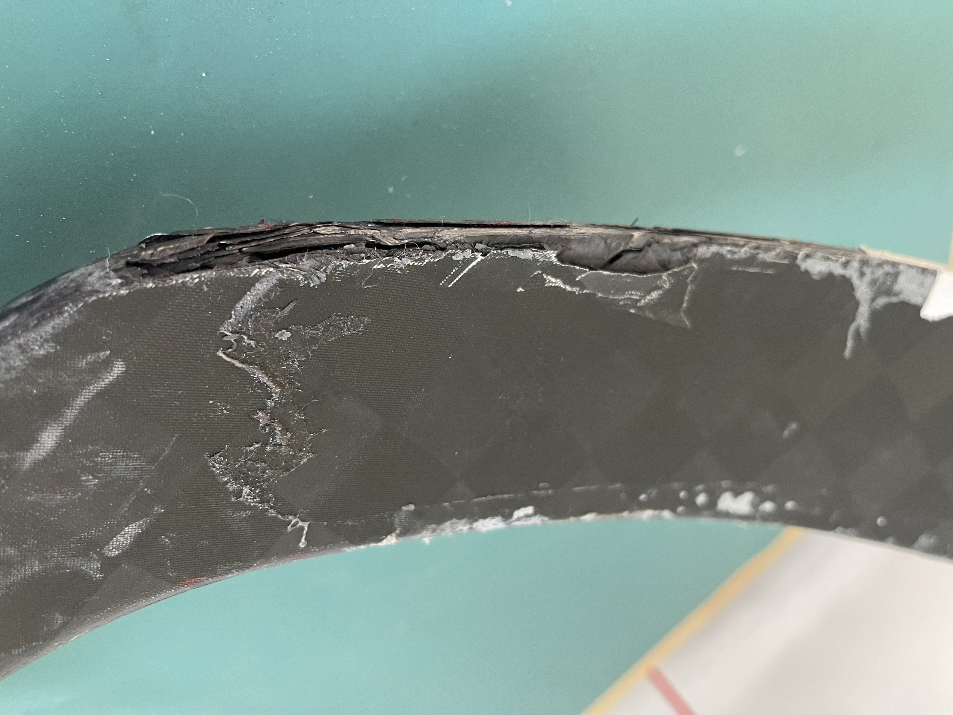 Close-up of the split, frayed blade edge